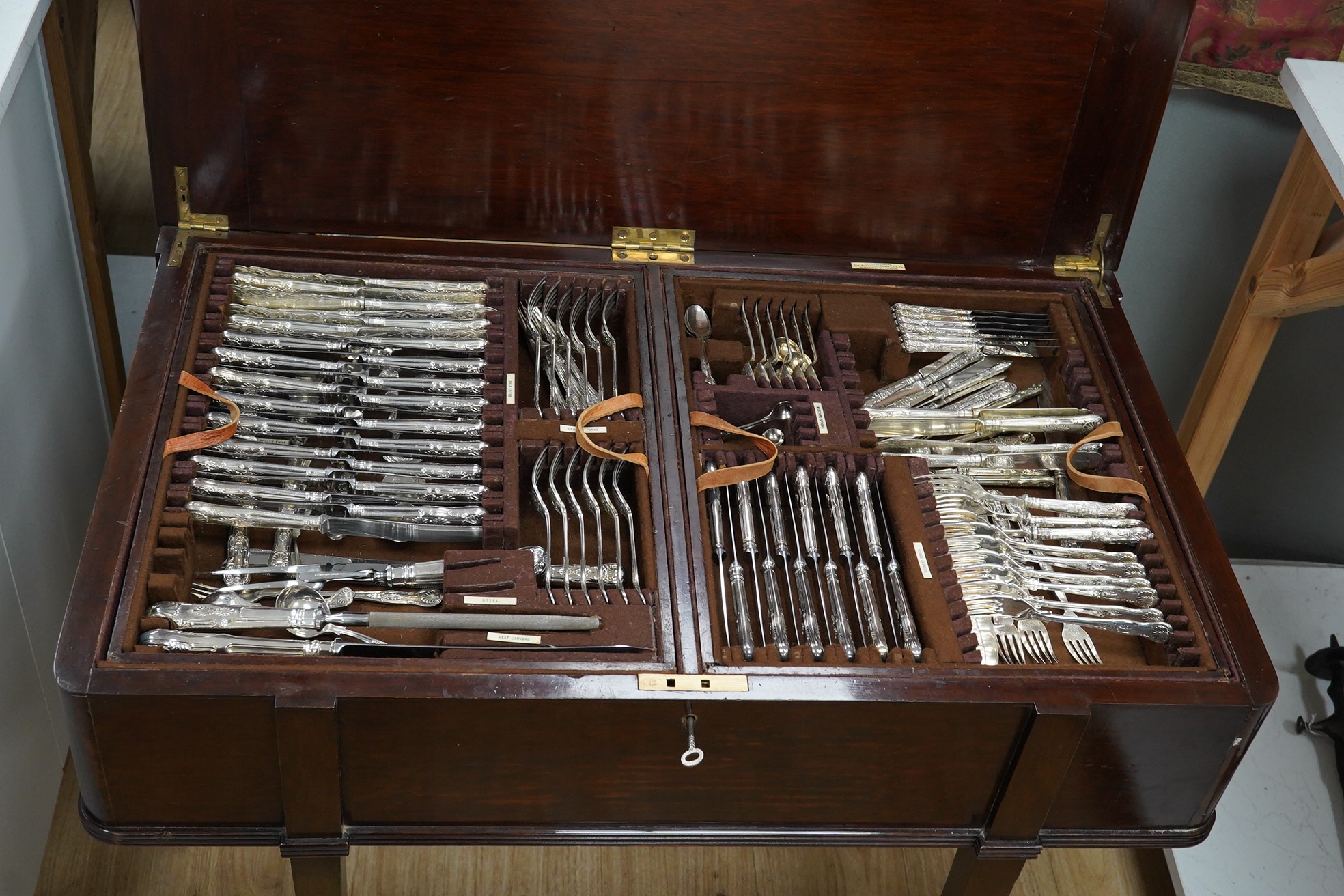 A mid 20th century comprehensive harlequin set of Kings pattern silver plated cutlery, mahogany cased, 90cm wide. Condition - fair to good